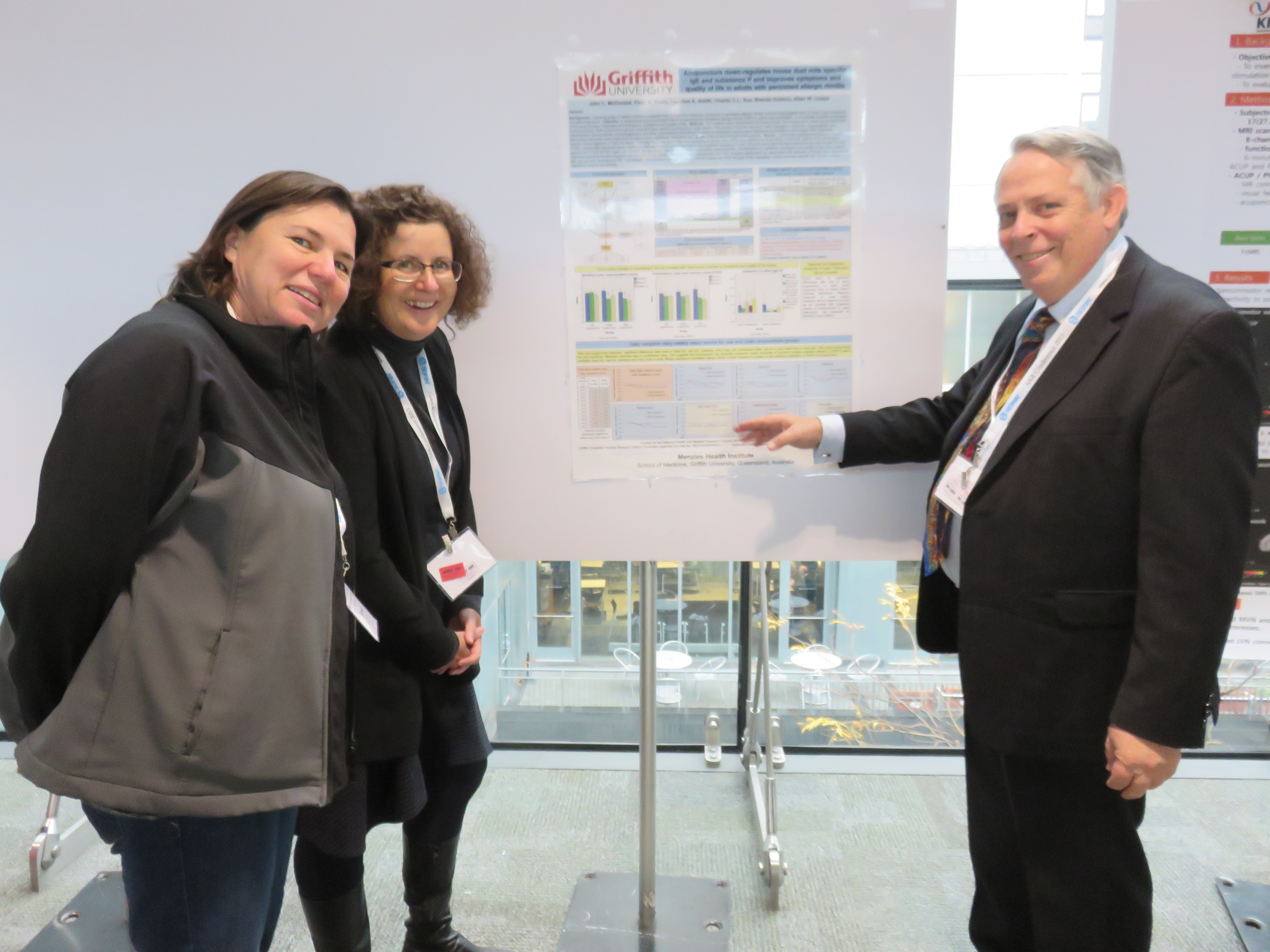 Brenda Golianu, Caroline Smith and John McDonald at SAR conference, Harvard